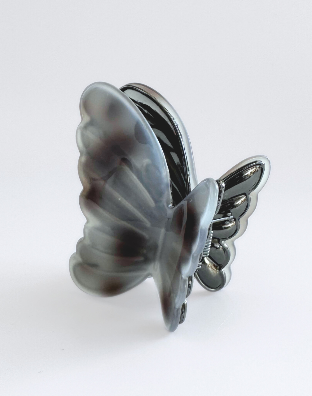 wing clip butterfly grey